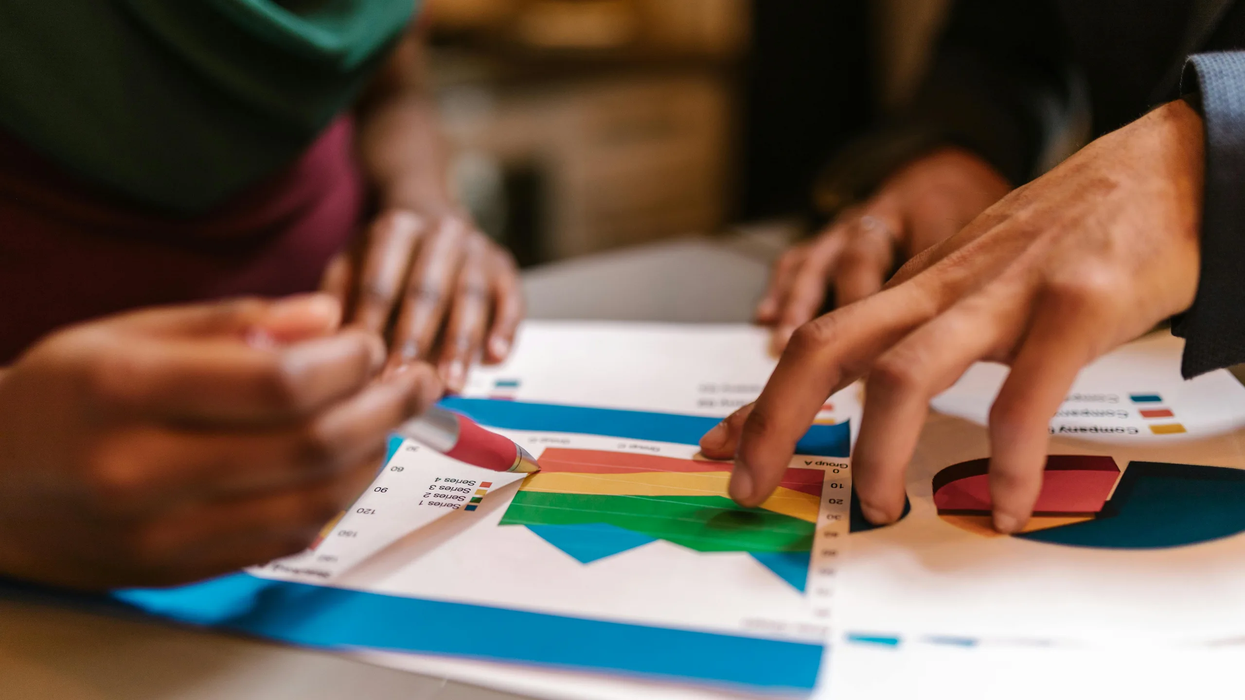 Team analyzing negotiation strategy and data